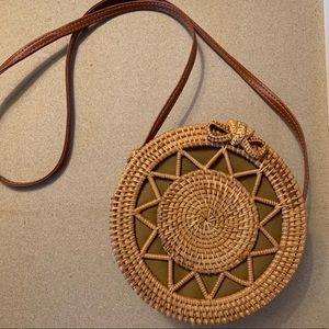 Round rattan crossbody